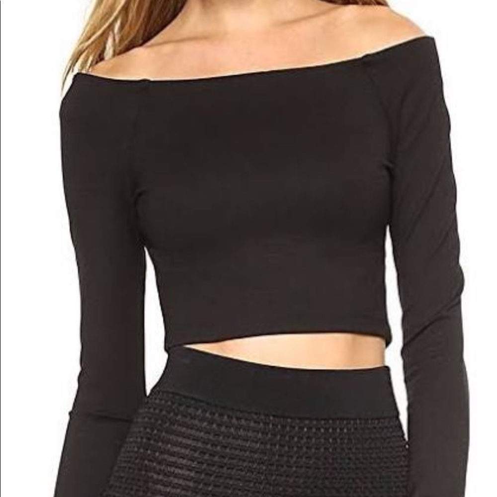 A RONNY KOBO black long sleeve crop top.